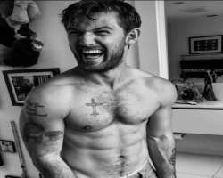 He is a tattoo lover and has a total of seven tattoos including an Arabic script on his right arm, a Celtic cross on his chest, the word 'Emma' on his